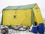 21 Kitchen Tent In Light Snow At Shagring Camp On Upper Baltoro Glacier When I woke the next morning at Shagring camp on the Upper Baltoro Glacier, snow had started to fall on the kitchen tent.